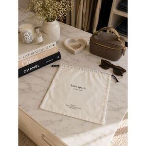 kate spade pale drawstring dust bag New Quiet Luxury Organization Closet Display